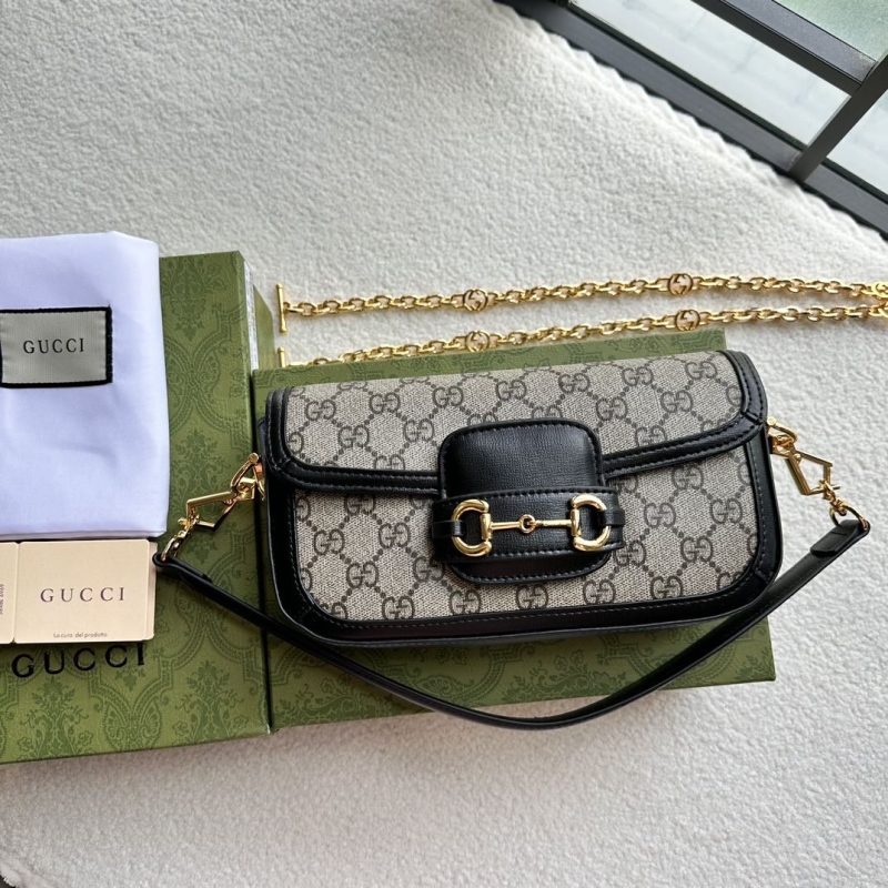 G*u*i top handle bags